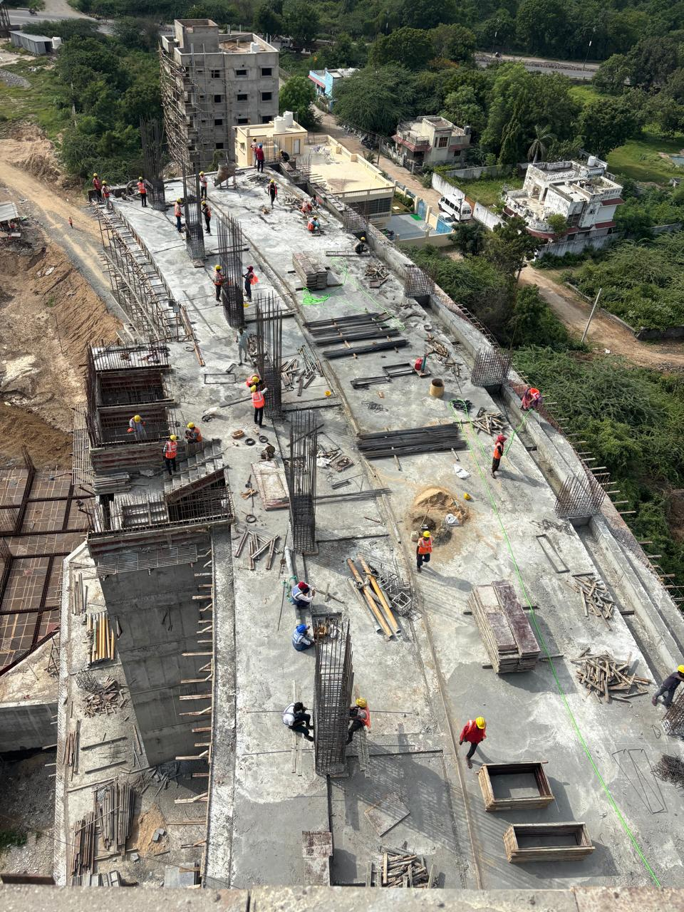 Construction team working on reinforced concrete at Mount Abu